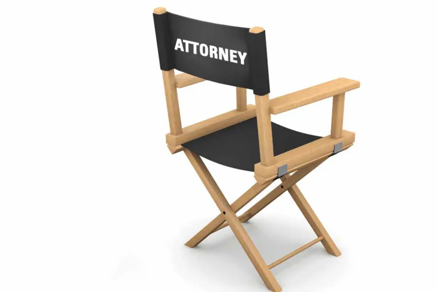 A film chair with the word attorney written on the back