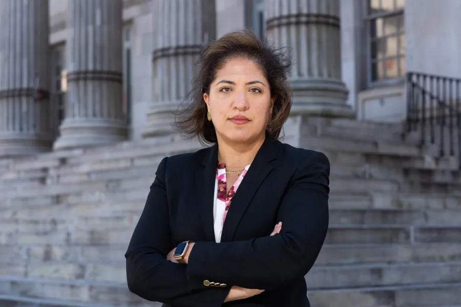 Nadia Shihata, standing in front of a court house 