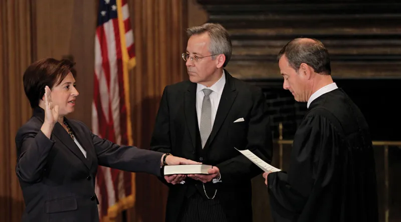 Jeffrey Minear, ’82, held the Bible as Chief Justice John Roberts Jr. administered the oath to Associate Justice Elena Kagan in 2010.