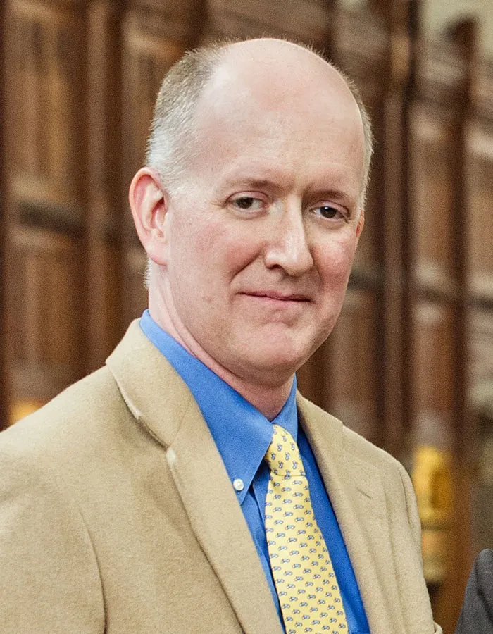A portrait of Dan Crane, the Richard W. Pogue Professor of Law.
