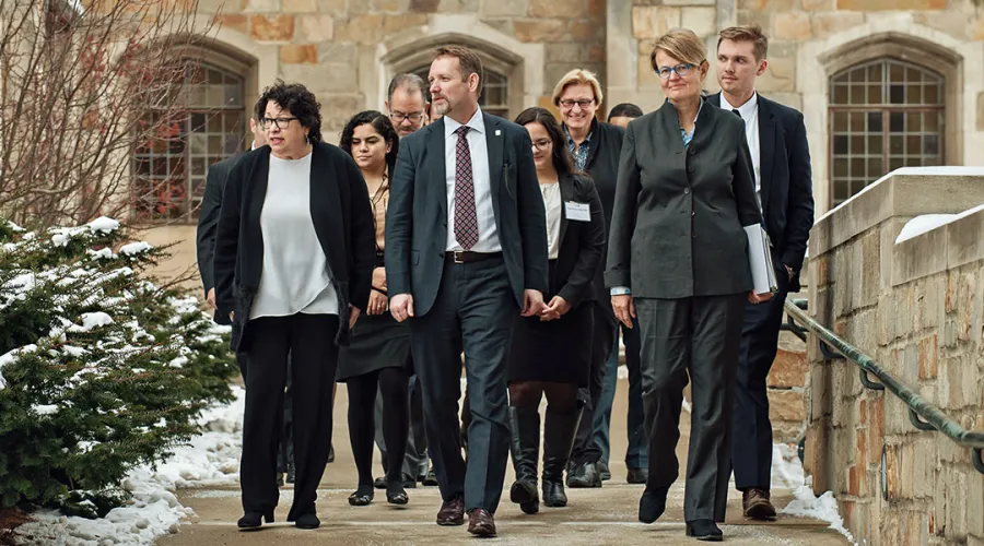 Susanne Baer walking with Dean Mark West and Justice Sotomayer