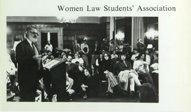 A professor lectures to the Women Law Students' Association members.