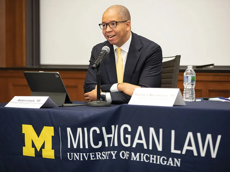 David Foltyn, ’80 speaks in front of a classroom during a lecture at Michigan Law.