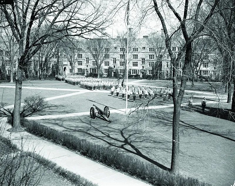 Soldiers march across the Law Quad.