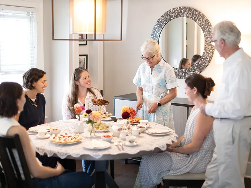 Ginny Miller, Shannon Hickey, Ellen Chirikos, and Aoife Bennett having “Afternoon Tea with Professor McCrudden and His Wife, Caroline”