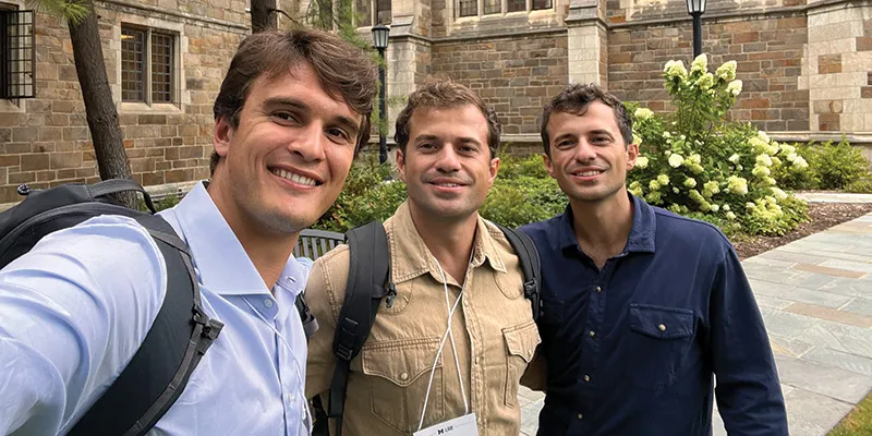 Jem Ruf with Diamantis and Socratis Zavitsanos outside of the Lawyers Club