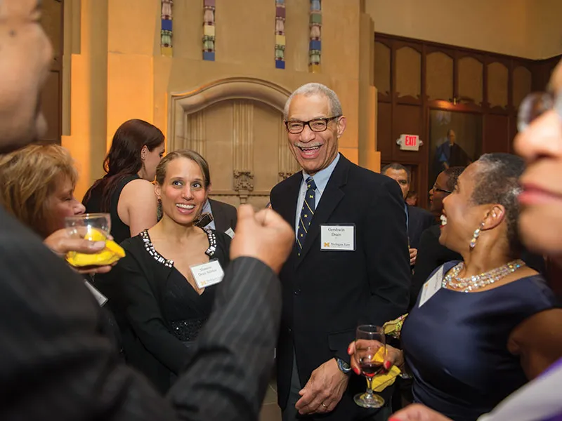 the Hon. Gershwin Drain, ’72, and his daughter, Shannon Salinas, ’02