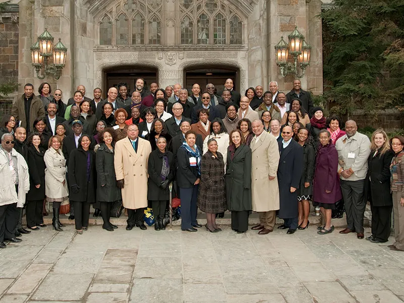 Alumni reunion attendees on the steps of the Reading Room