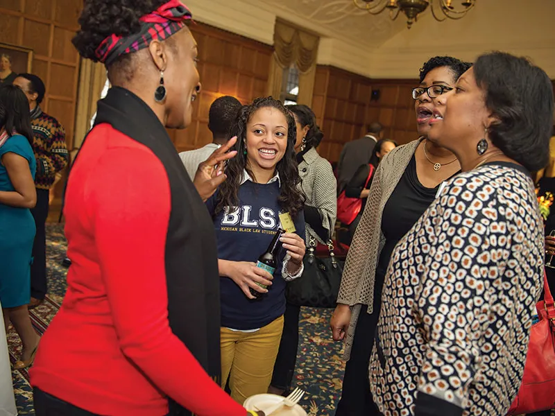 Brittany Nash, a 3L, talks with alumni  at Friday’s networking reception