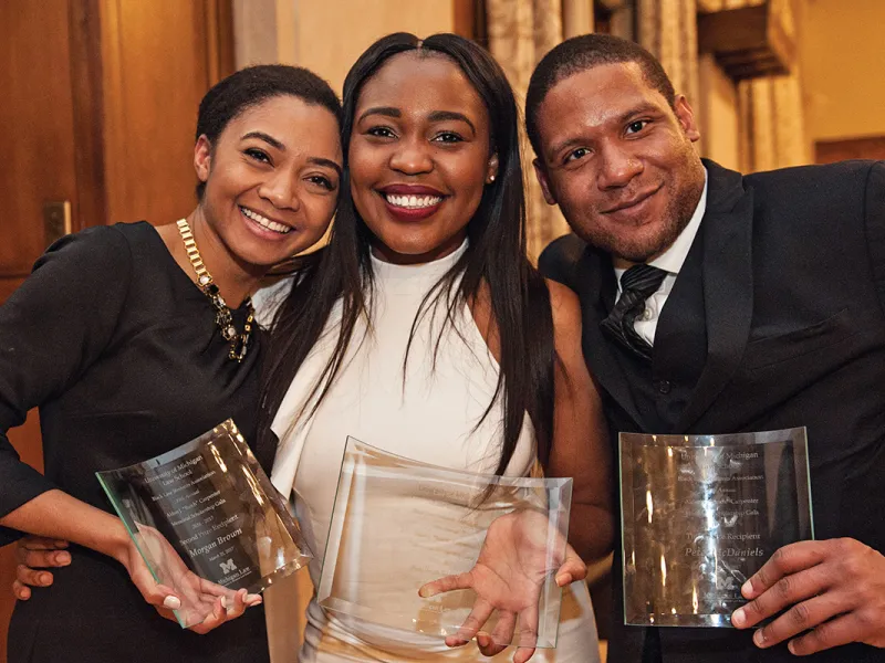 Butch Carpenter Scholarship winners Morgan Brown, Edna Turay, and Peter McDaniels—all 1Ls. African American alumni who are retired or sitting judges pose together  at Saturday’s luncheon.