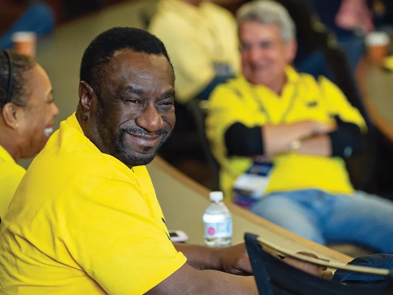 Eric Martin, ’78, is all smiles as he returns to the classroom at Reunion.