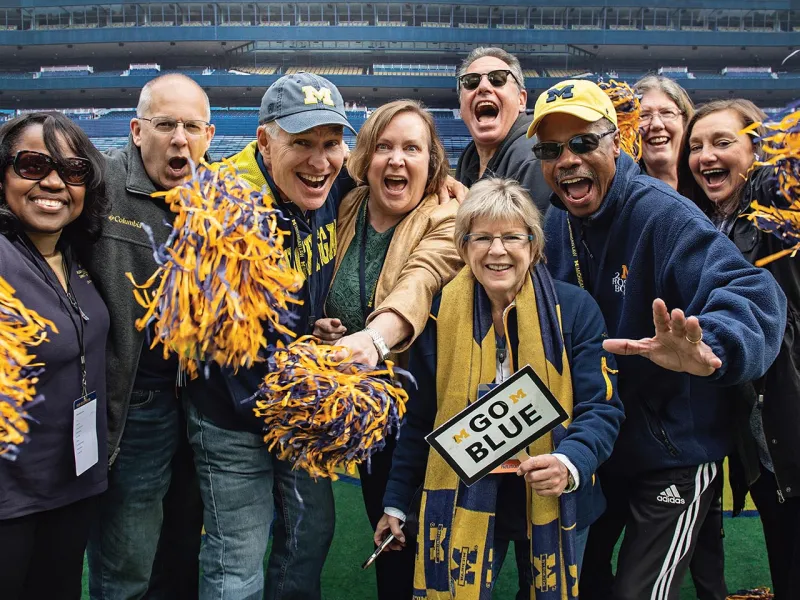 Hail to the Victors: Members of the Class of 1983 and their families share in the excitement of a Football Saturday in Ann Arbor.