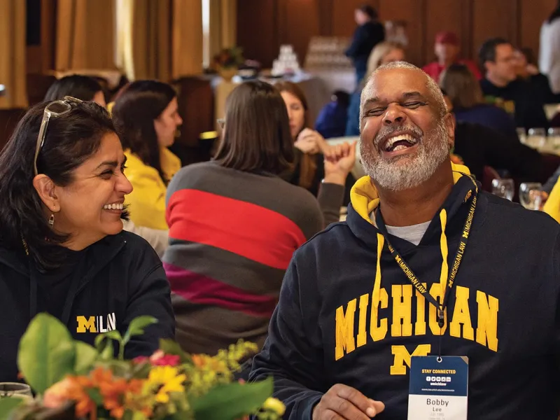 Robert Lee, ’93, shares a laugh in the Michigan League.