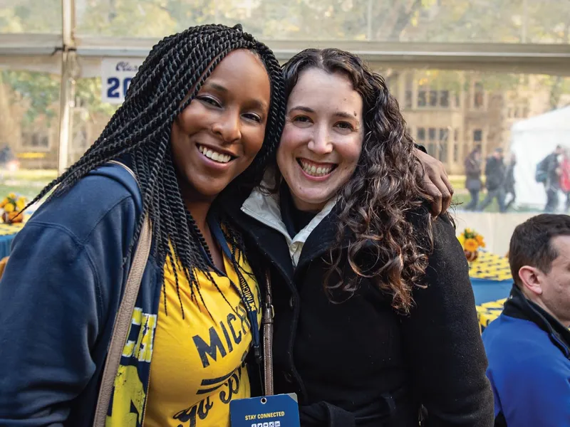 Leticia Kimble, ’08, and Julie Marder, ’07, enjoy the tailgate.
