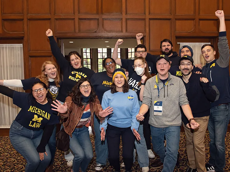 A group of students cheering.