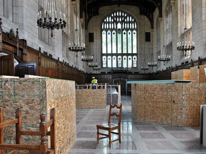The Lawyers Club dining hall is emptied out and plywood barriers are erected around sections of the floor..