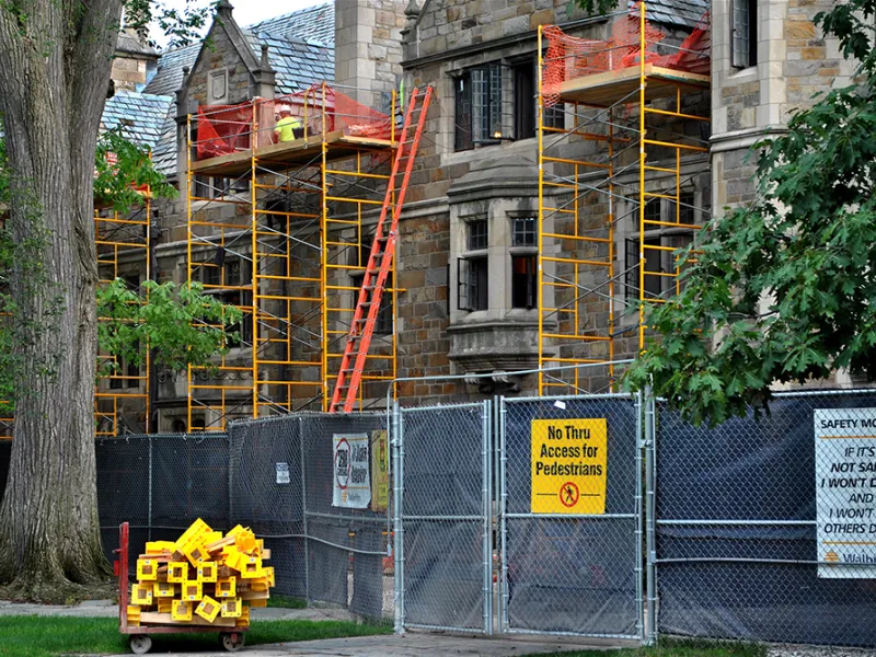 Fencing and scaffolding encase the exterior of the Lawyers Club.