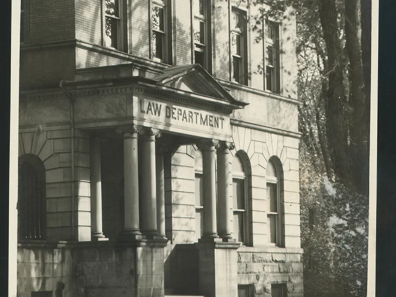 The entrance to the original Law Department was set within a deep porch flanked by columns.