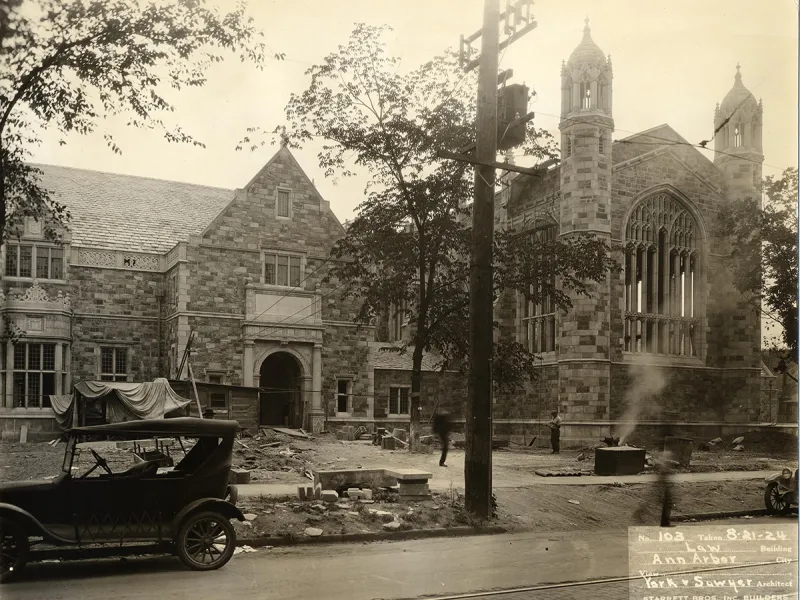 In 1924, the Lawyers Club is nearly complete with a car parked on the street.