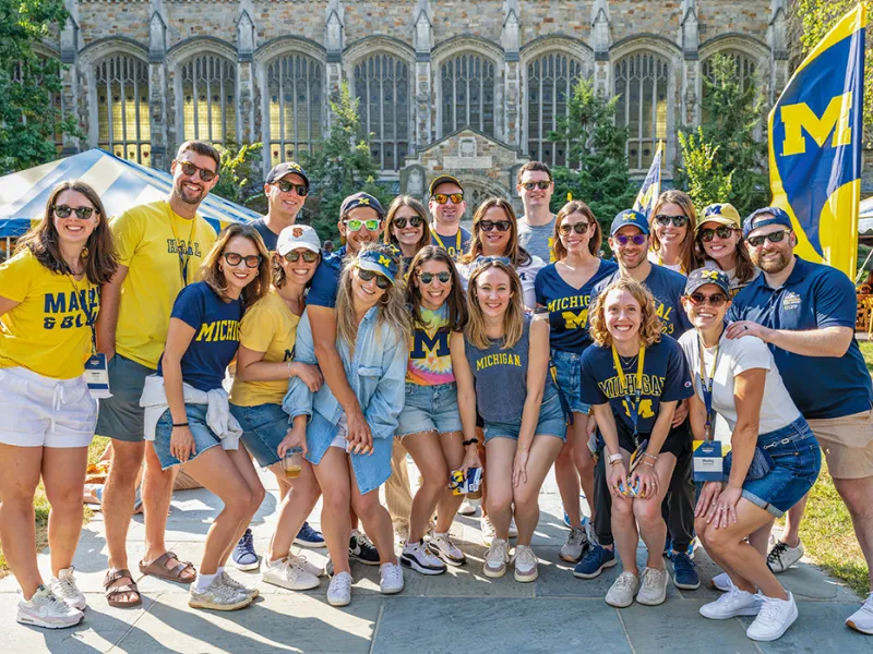 Michigan Law alumni gather in the Law Quad for an alumni reunion.