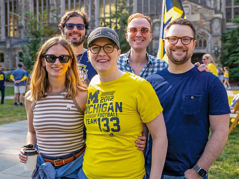 Michigan Law alumni gather in the Law Quad for an alumni reunion.