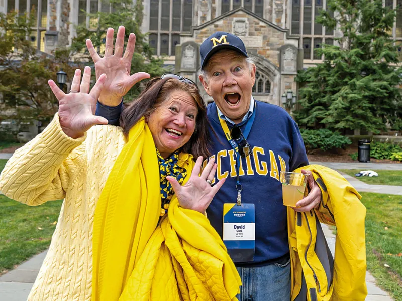 Michigan Law alumni gather in the Law Quad for an alumni reunion.