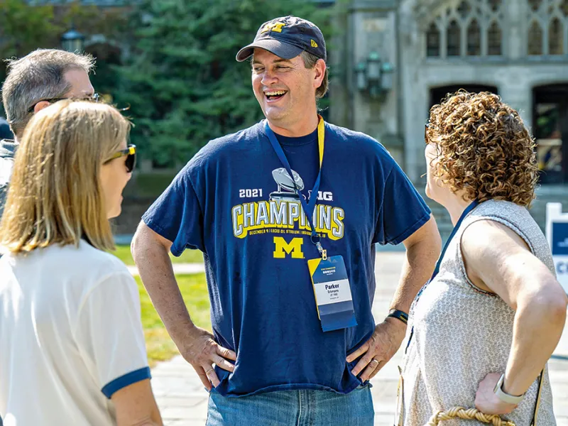 Michigan Law alumni gather in the Law Quad for an alumni reunion.