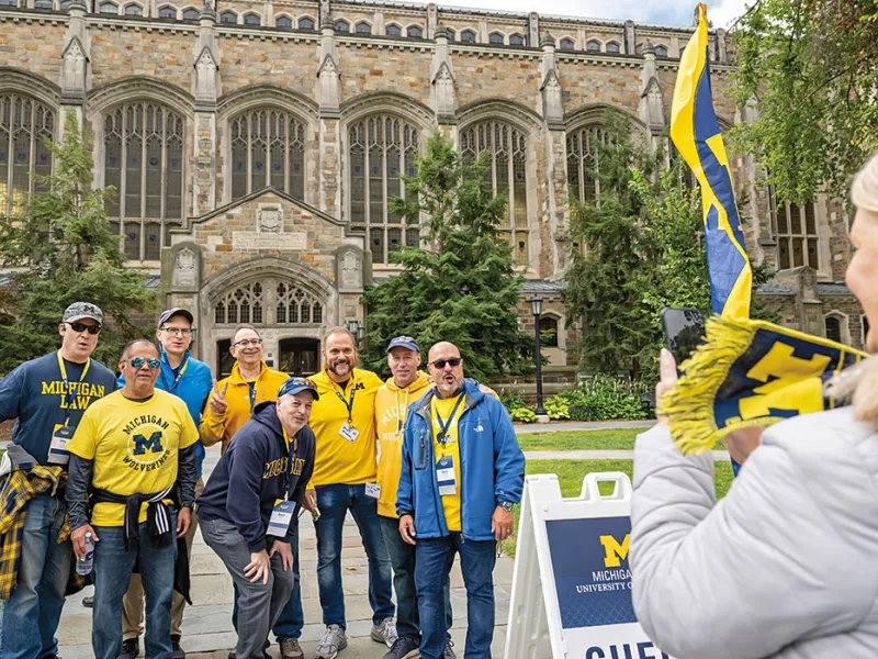 Michigan Law alumni gather in the Law Quad for an alumni reunion.