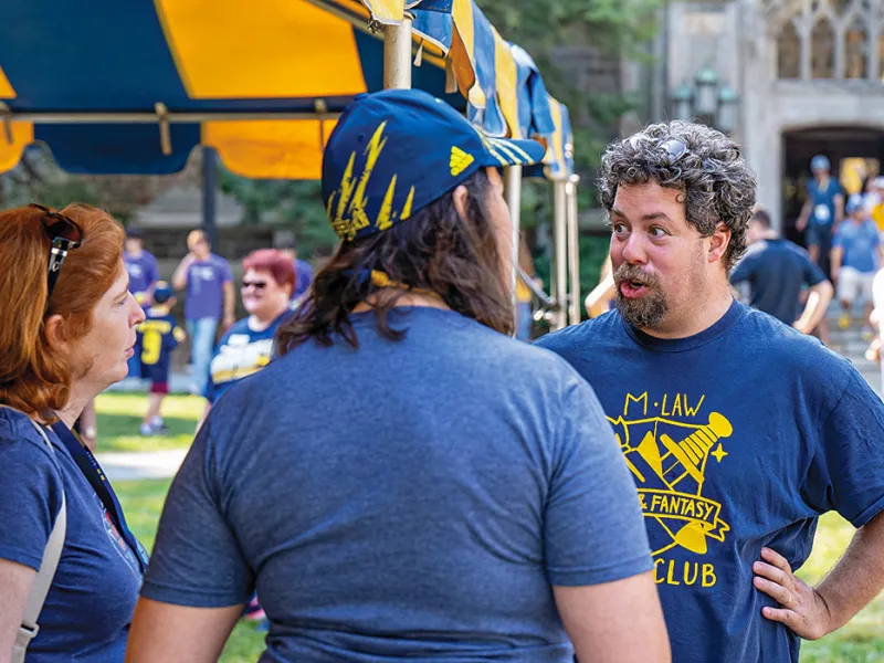 Michigan Law alumni and faculty gather in the Law Quad for an alumni reunion.