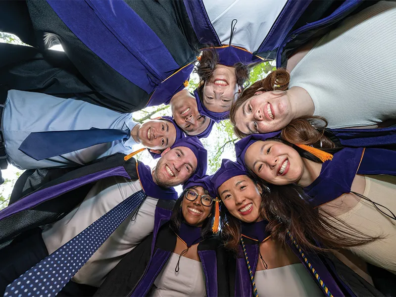 Michigan Law students huddled together on Senior Day Michigan Law students huddled together on Senior Day