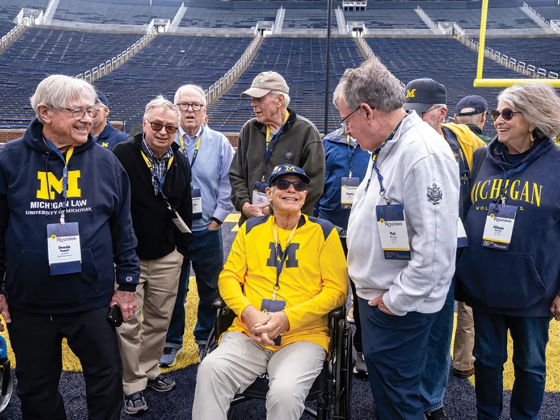 Michigan Law alumni gathered on the Michigan Stadium field