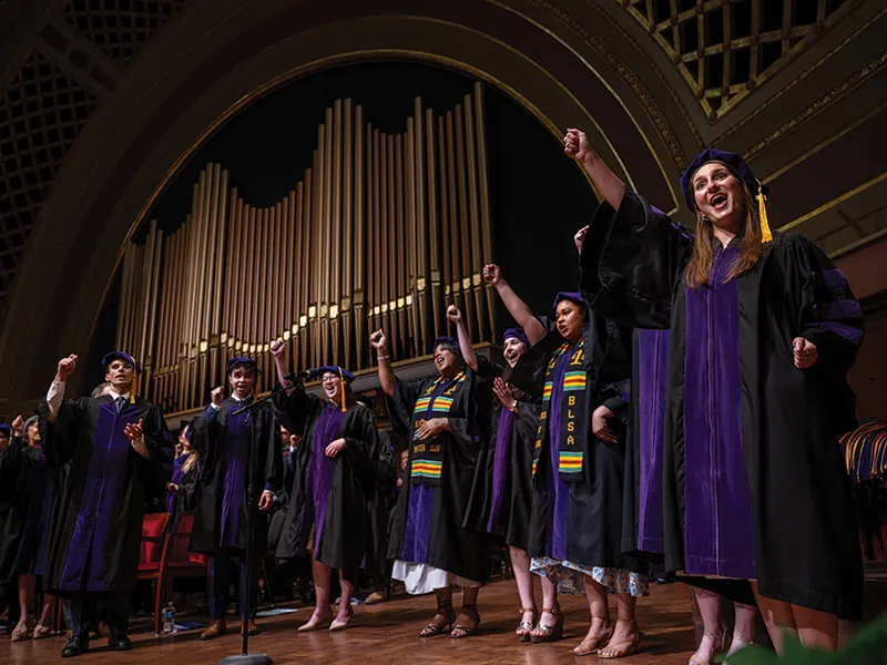 Michigan Law Headnotes singing during Senior Day.