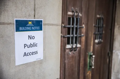 A sign attached to the exterior of the Law School reads "No Public Access."