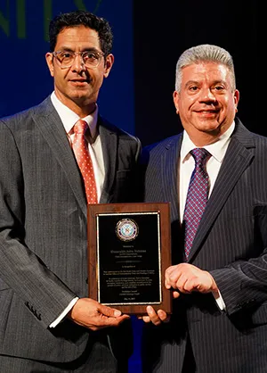 Asim Rehman receives award