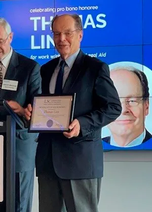Thomas Linn receives the 2025 Pro Bono Service Award from the Legal Services Corporation.