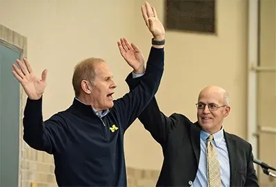 Two men cheering