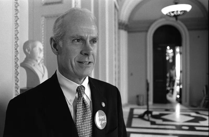 Rep. John E. Porter in an official looking hall way