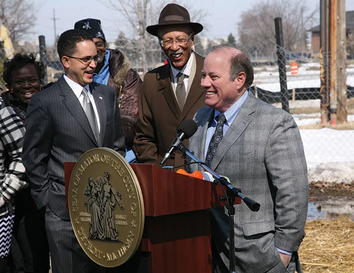 Mayor Mike Duggan, ’83, speaking at a press conference