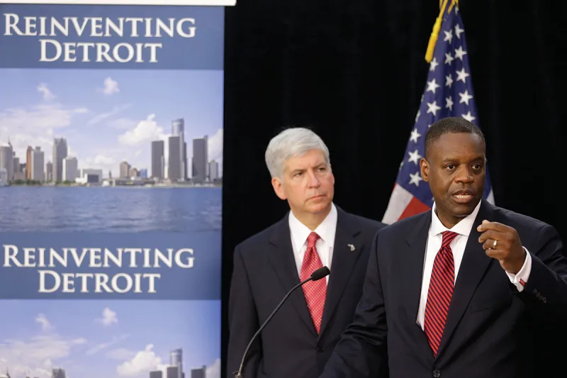 Gov. Snyder and Emergency Manager Kevyn Orr address reporters during  a news conference in Detroit.