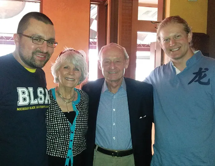 Janet and John Boyles with scholarship recipients Joseph Flynn (left) and Marc McKenna (right).