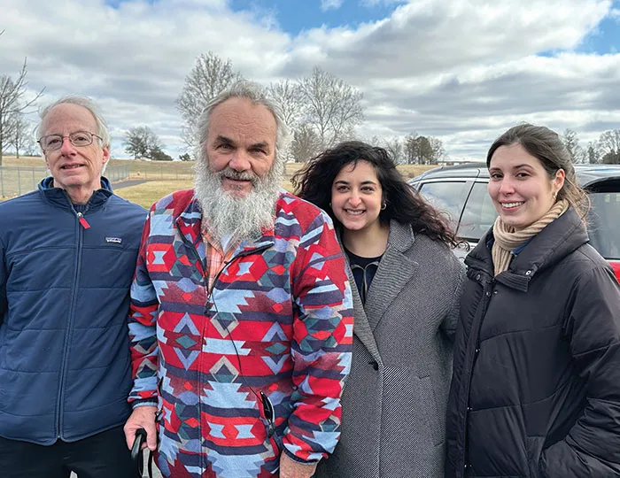 Jeff Titus pictured after his release from prison with (far left) Professor David Moran  and Naomi Farahan and Olivia Daniels, who worked on Titus’s case as student-attorneys in the Michigan Innocence Clinic.