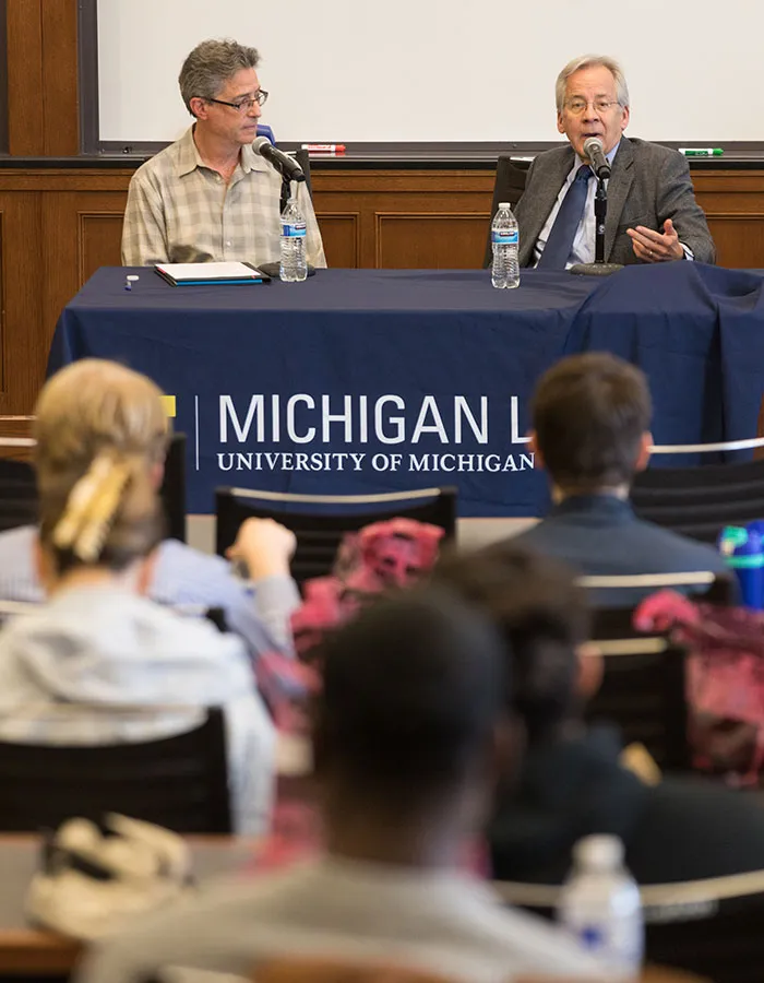 Minear, pictured on the right with Professor and Dean Emeritus Evan Caminker during a visit to the Law School in fall 2022, remains active in the law after stepping down from the Court.
