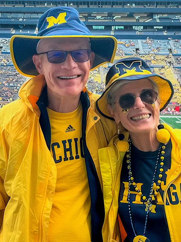 Bill, ’71, and Cindy Rainey at a Michigan football game.