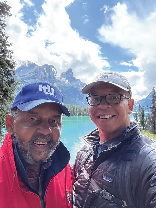 Aaron Lewis, ’05, with his father, David Baker Lewis