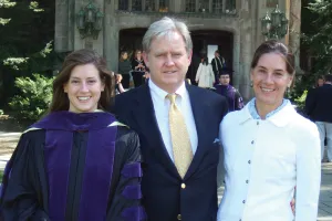 Sophia Hudson, ’06, and her parents, Joe and Lydie Arthos Hudson, ’86, celebrating her graduation in the Law Quad.