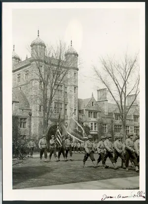 Students carry flags in front of the Lawyers Club.