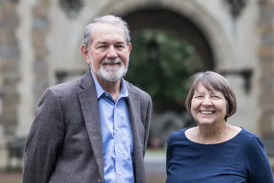 Julie Metzger and Sam Bufford standing in front of building