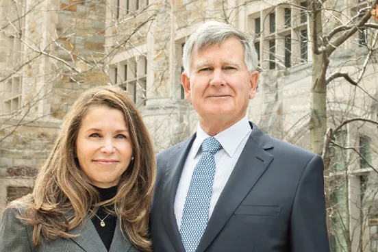 Chris and Lisa Jeffries standing in front of  Jeffries Hall 