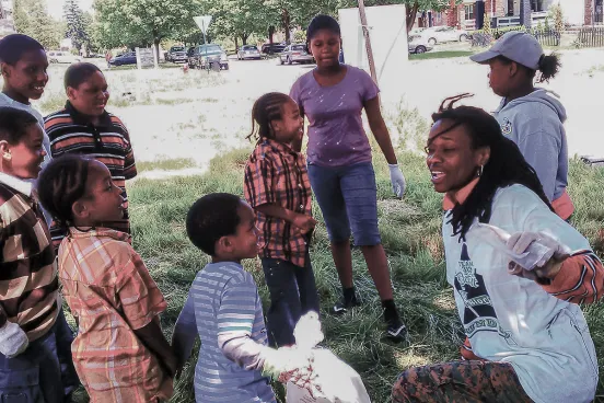 Felicia Andrews, ’04 working with children in Detroit