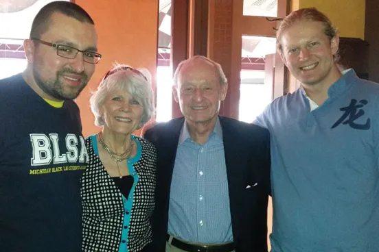 Janet and John Boyles with scholarship recipients Joseph Flynn (left) and Marc McKenna (right).